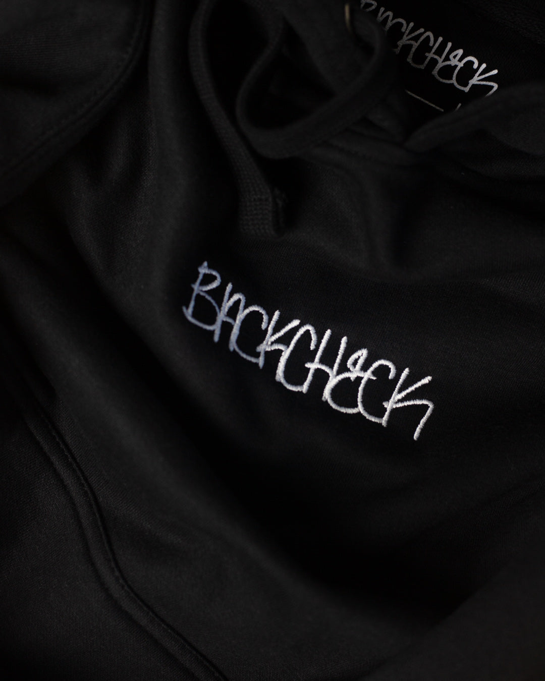 BACKCHECK Embroidered Hood Black